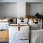 brown cardboard boxes on brown wooden table