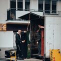 a person standing in a doorway of a building