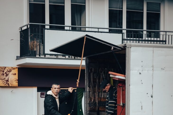 a person standing in a doorway of a building