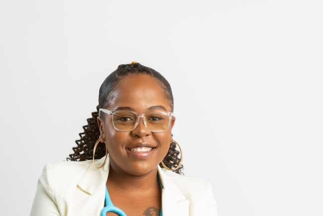 a woman in a white coat